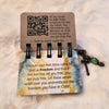 The Freedom Flip has a QR code inside the front cover. Scan the code and listen to beautiful music and scriptures being read over you. It is a truly special experience.