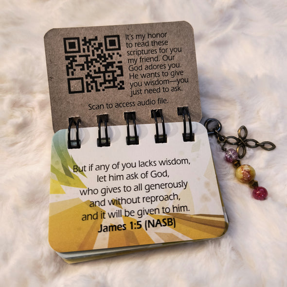 The Wisdom Flip has a QR code inside the front cover. Scan the code and listen to beautiful music and scriptures being read over you. It is a truly special experience.
