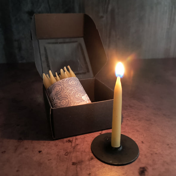 20 minute candle on a stand and box of candles